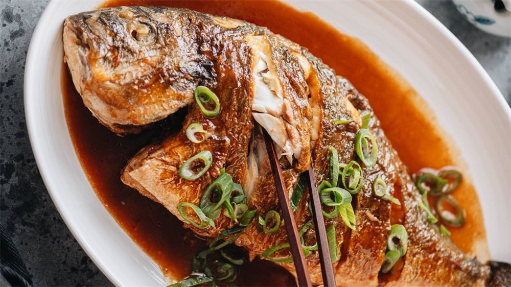 Chinese Braised Whole Fish with Ginger & Scallions.png